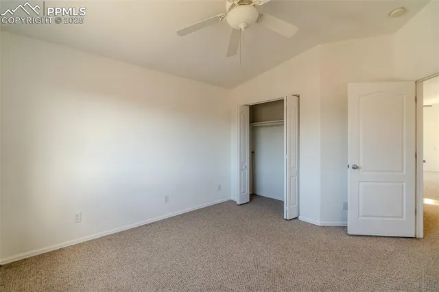 an empty room with a bathroom
