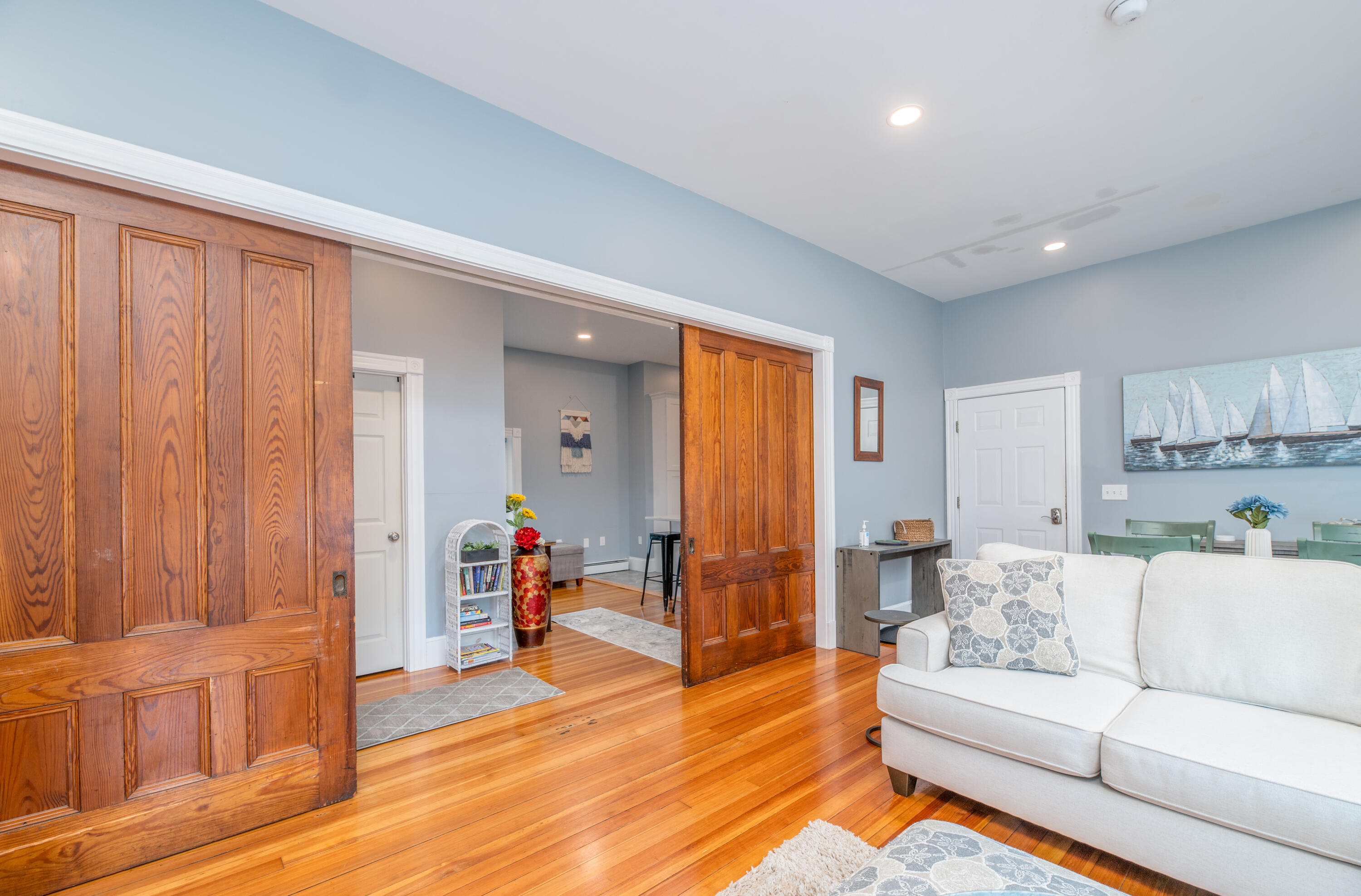 89 Water Street, Unit 2 Hallowell, ME 04347 - Photo 7 of 30 Livingroom - large pocket doors