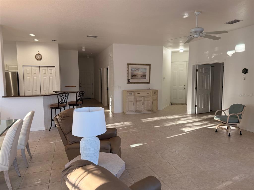 1802 Triano Circle, Unit 1802 Venice, FL 34292 - Photo 6 of 19 a living room with furniture and view of kitchen