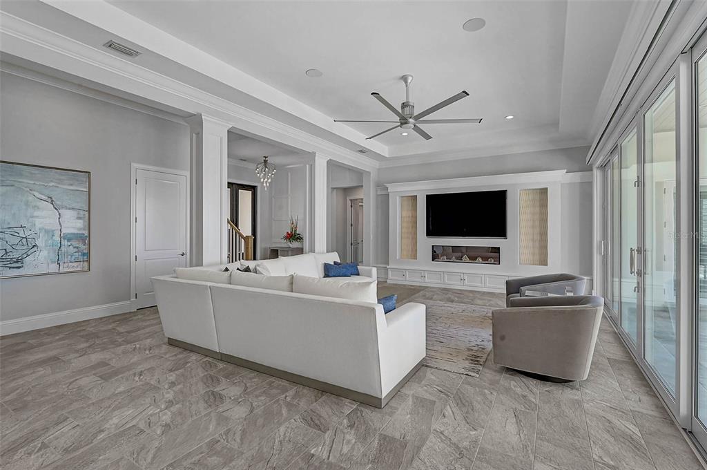 101 Seagull Lane Sarasota, FL 34236 - Photo 12 of 90 a living room with furniture and a flat screen tv