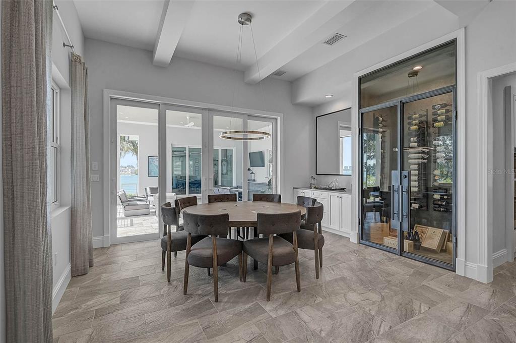 101 Seagull Lane Sarasota, FL 34236 - Photo 21 of 90 a view of a dining room with furniture window and outside view