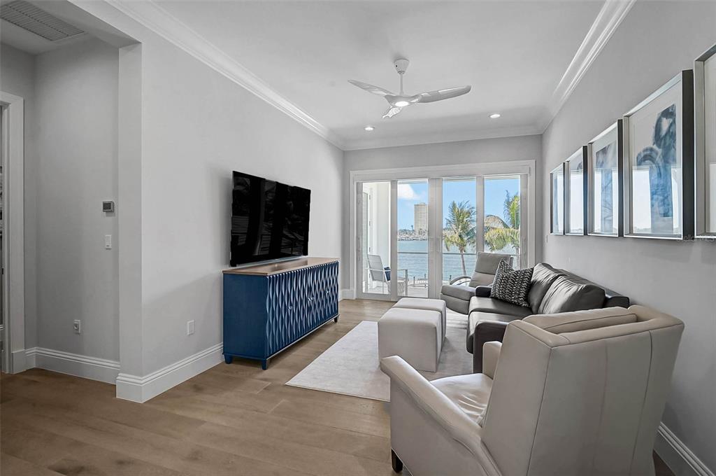 101 Seagull Lane Sarasota, FL 34236 - Photo 37 of 90 a living room with furniture and a flat screen tv
