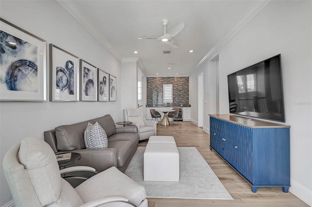 101 Seagull Lane Sarasota, FL 34236 - Photo 38 of 90 a living room with furniture and a flat screen tv