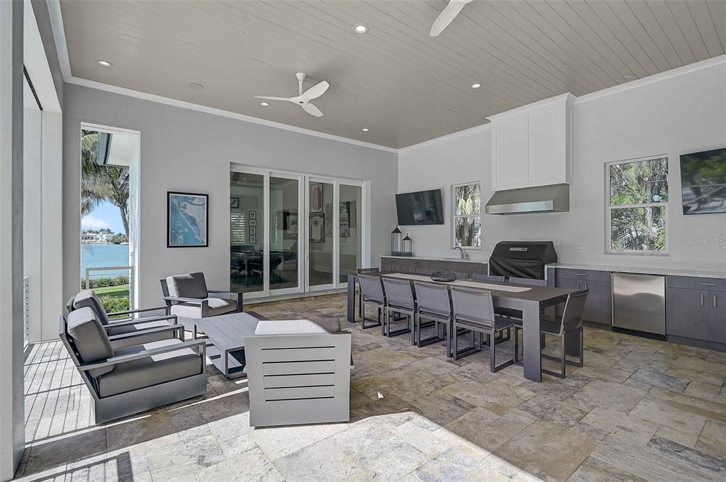 101 Seagull Lane Sarasota, FL 34236 - Photo 53 of 90 a living room with furniture a window and a table