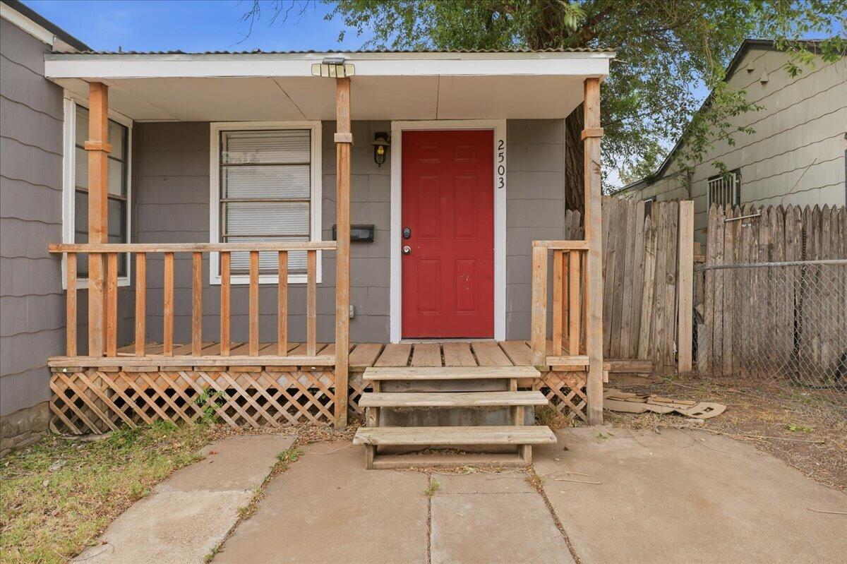 2503 30th Street Lubbock, TX 79410 - Photo 3 of 26 front view of a house with a window