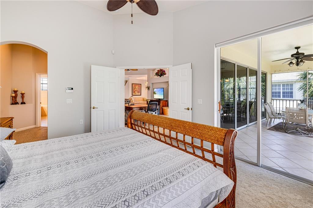 19081 Ridgepoint Drive, Unit 201 Estero, FL 33928 - Photo 8 of 42 a bedroom with furniture and window