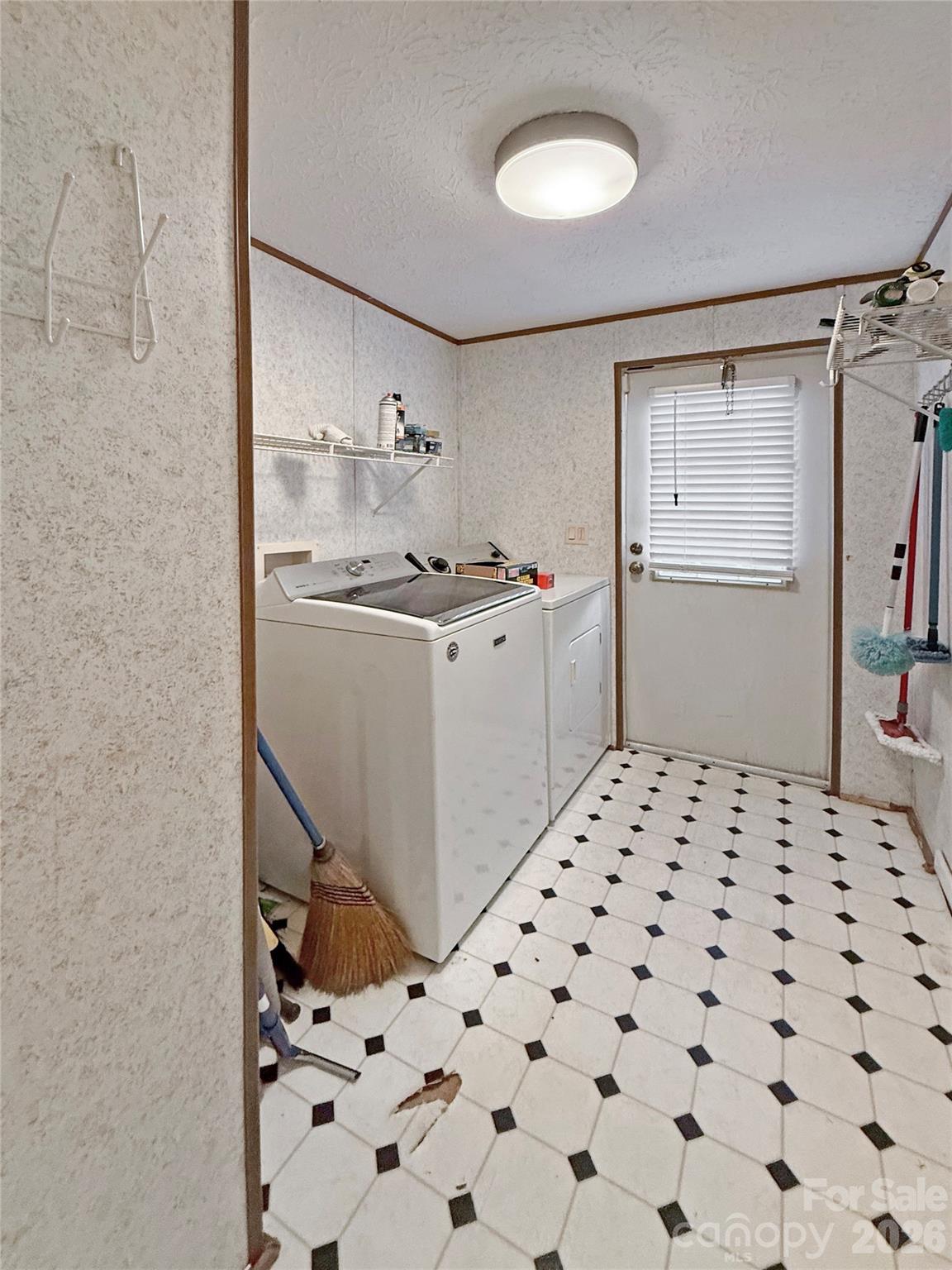 121 Haystack Lane Olin, NC 28660 - Photo 14 of 23 a kitchen with a sink a stove and cabinets