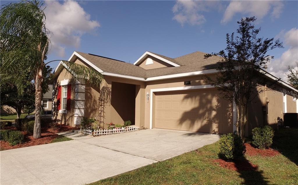 4709 Indian Deer Road Windermere, FL 34786 - Photo 1 of 1 a view of a house with basketball court