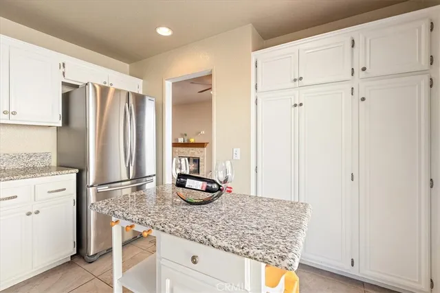 a kitchen with sink cabinets and appliances