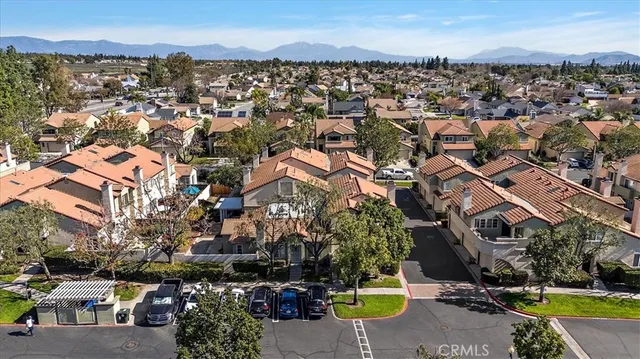 an aerial view of a city with lots of residential buildings