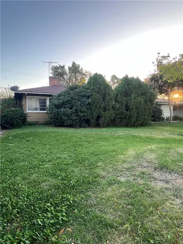 a view of a house with a big yard