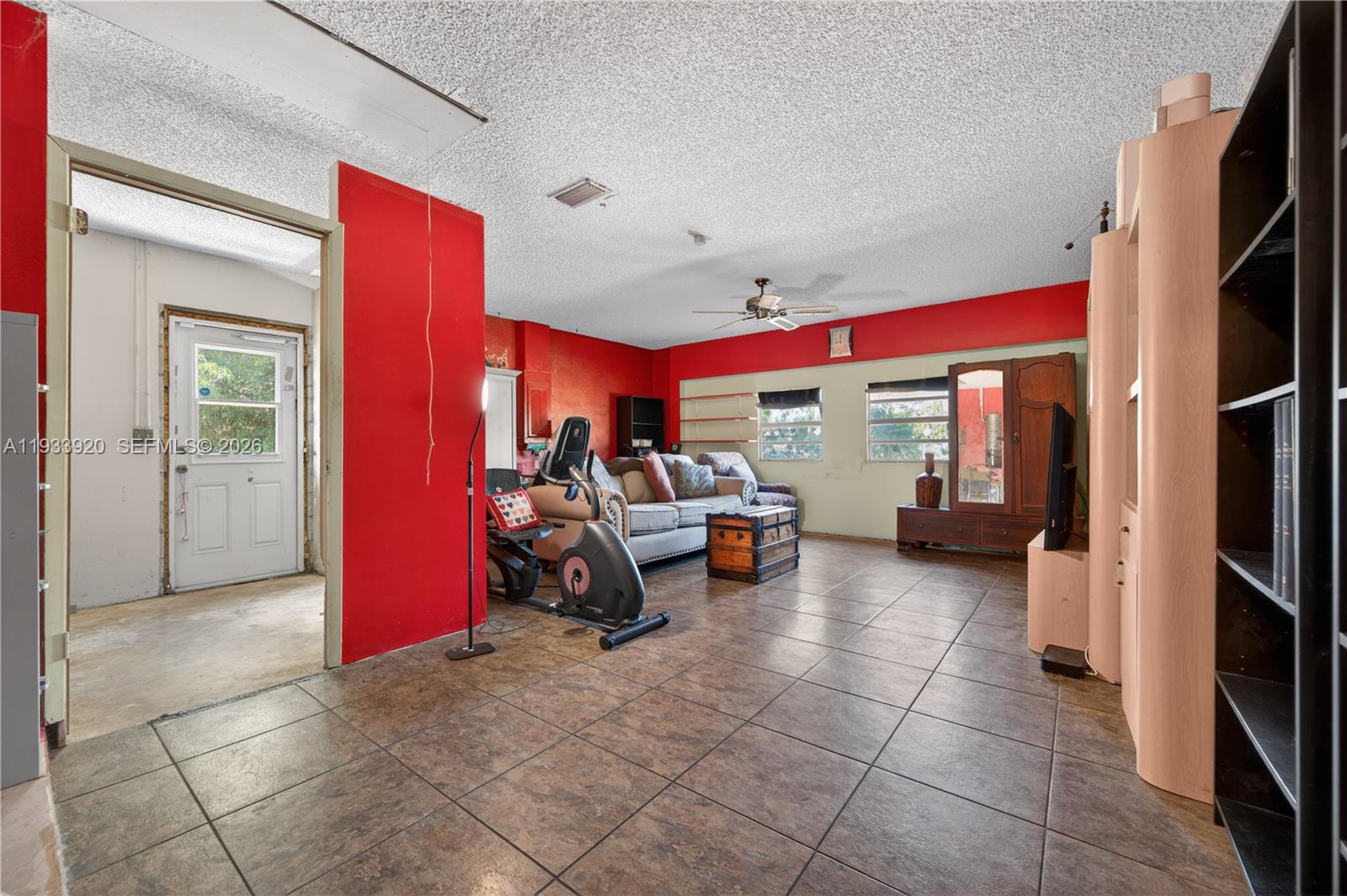 13228 158th Street North Jupiter, FL 33478 - Photo 13 of 21 a view of living room kitchen and trampoline