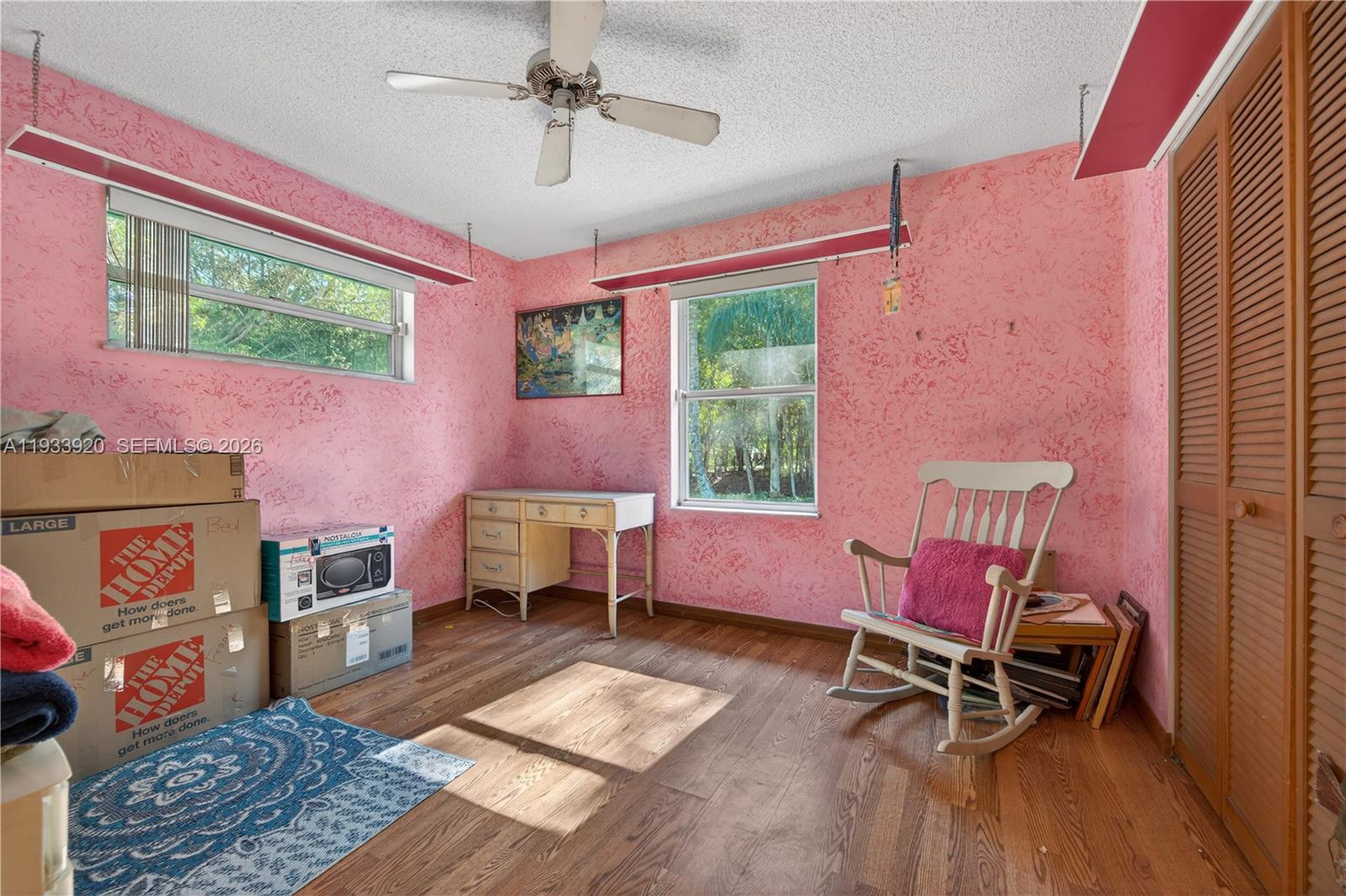 13228 158th Street North Jupiter, FL 33478 - Photo 9 of 21 a living room with furniture and a window