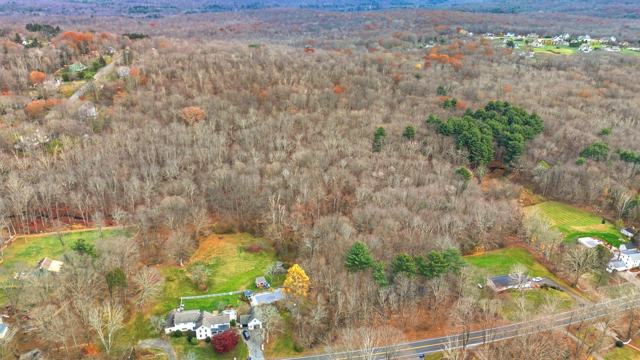 126 Hebron Road Bolton, CT 06043 - Photo 16 of 23 a backyard of a house with lots of green space