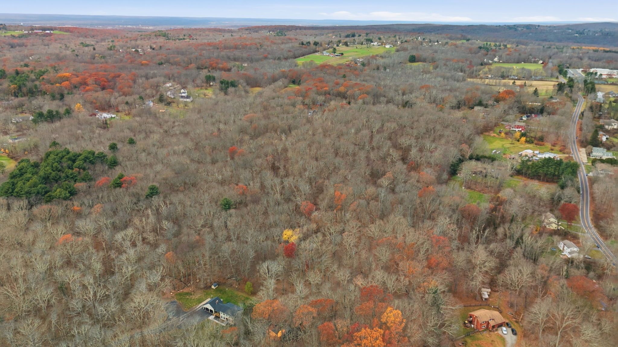 126 Hebron Road Bolton, CT 06043 - Photo 18 of 23 an aerial view of mountain with trees around