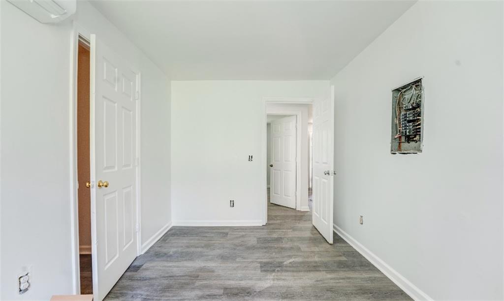 4494 Old Summerville Road Armuchee, GA 30105 - Photo 14 of 16 a view of a hallway with wooden floor