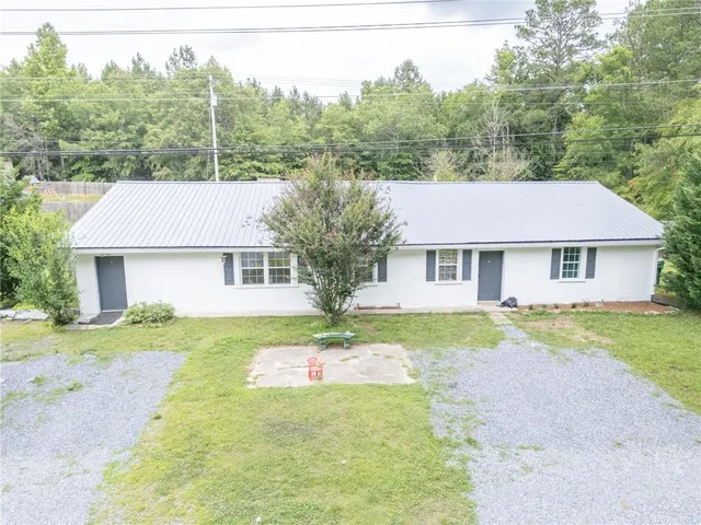 front view of a house and a yard