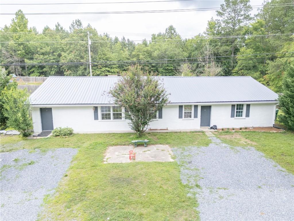 4494 Old Summerville Road Armuchee, GA 30105 - Photo 4 of 16 front view of a house and a yard