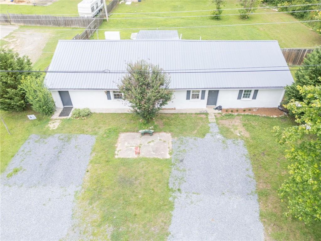 4494 Old Summerville Road Armuchee, GA 30105 - Photo 6 of 16 a front view of a house with a yard