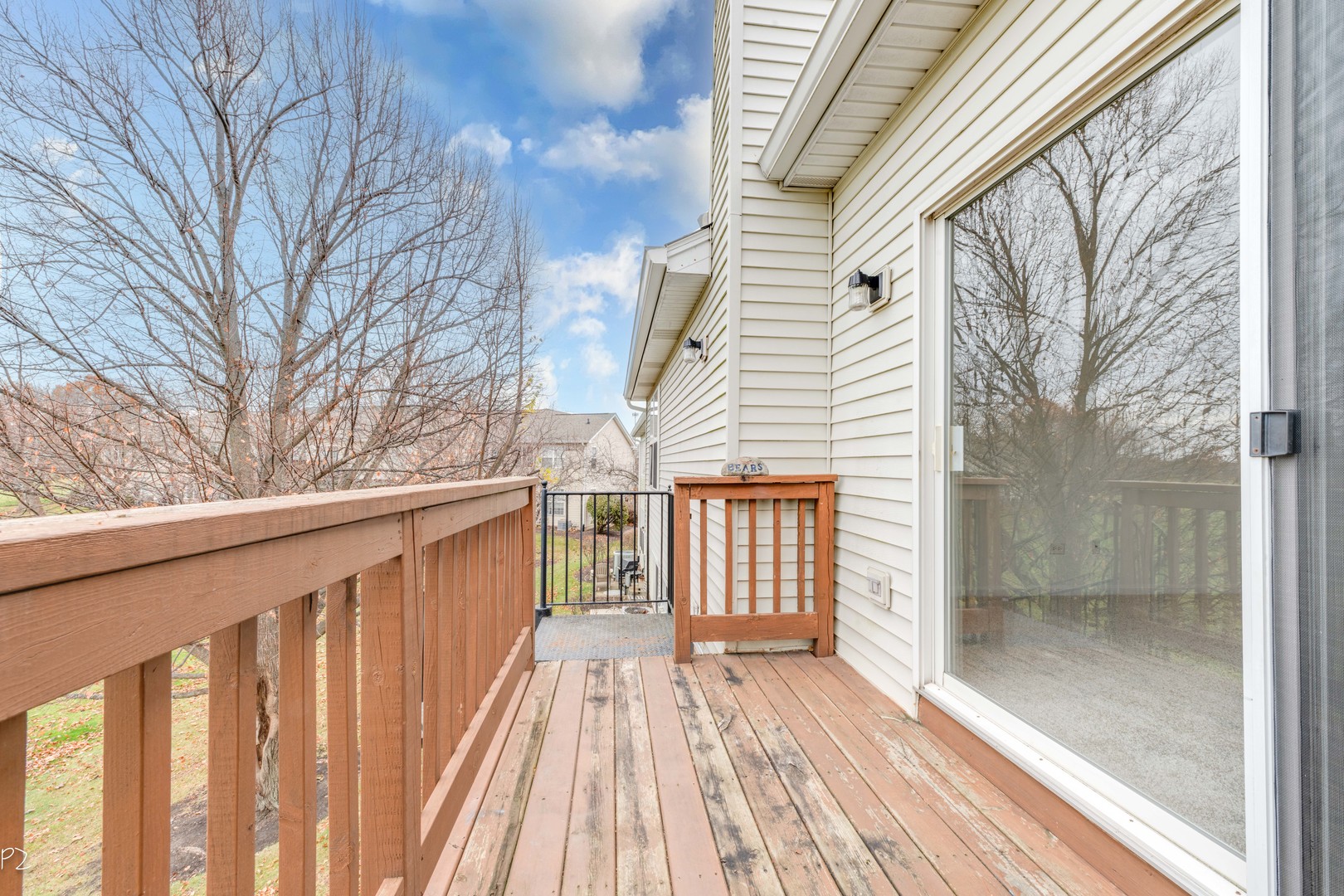 24181 Pear Tree Circle Plainfield, IL 60585 - Photo 12 of 25 a view of a wooden house with a large window