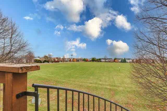 a view of balcony with wooden floor