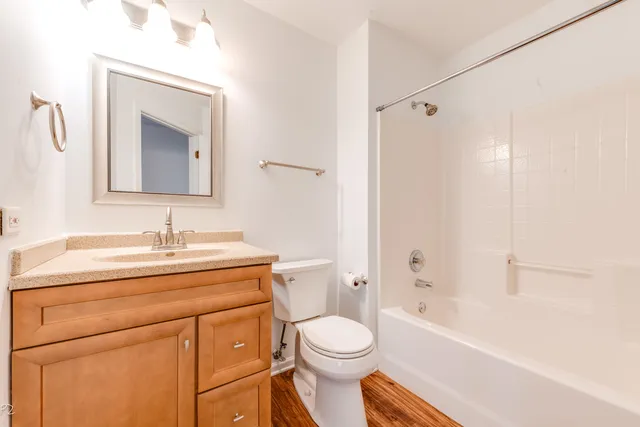 a view of a house with backyard porch and sitting area