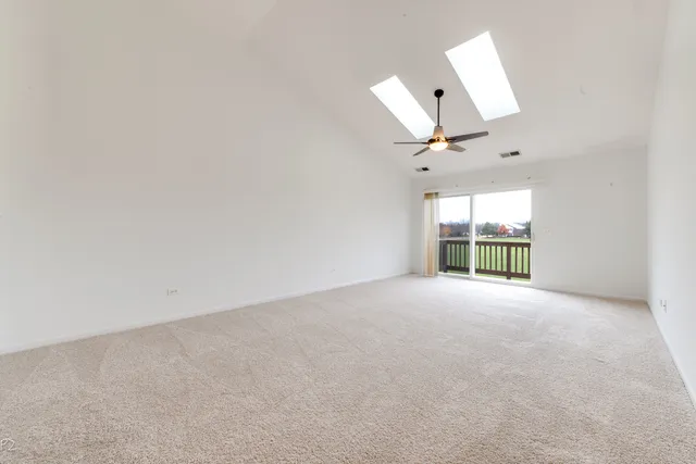 a view of a kitchen with a sink cabinets and appliances