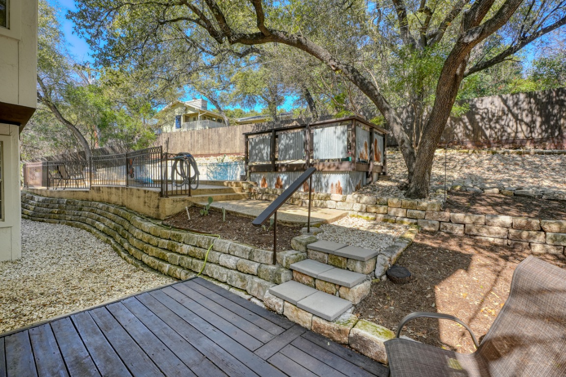 4804 Ranch Road 2222 Austin, TX 78731 - Photo 16 of 40 from back door to pool , terrace featuring an outdoor structure and a fenced backyard