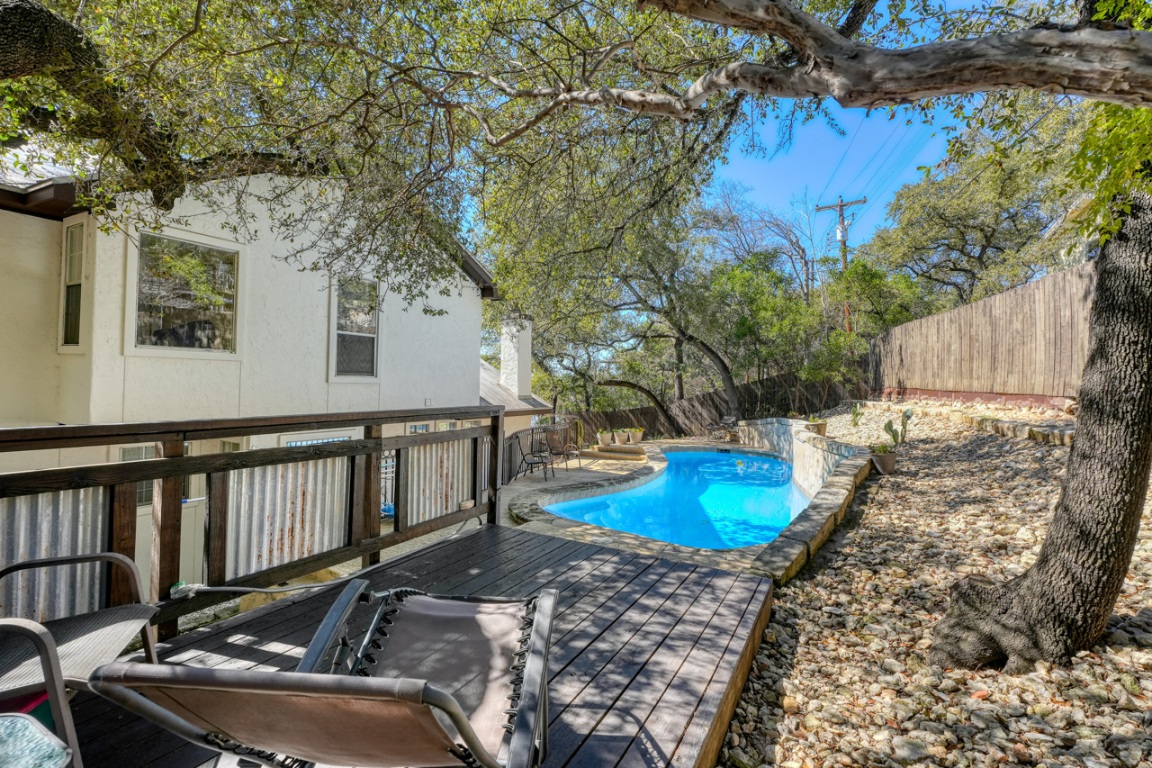 4804 Ranch Road 2222 Austin, TX 78731 - Photo 2 of 40 View of pool featuring a fenced backyard, a wooden deck, and a fenced in pool