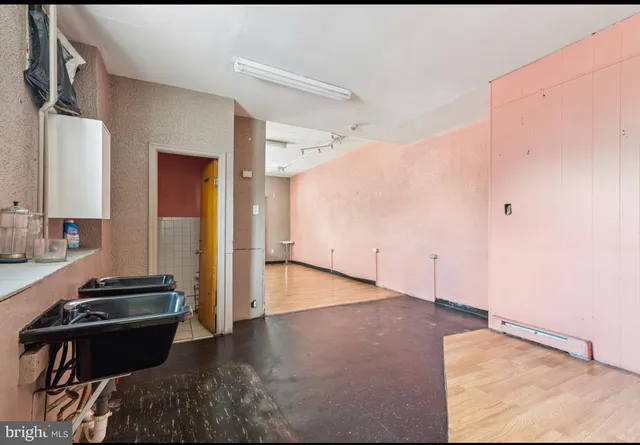 a kitchen with a appliances and cabinets