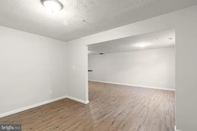 a bathroom with a toilet a sink and a shower