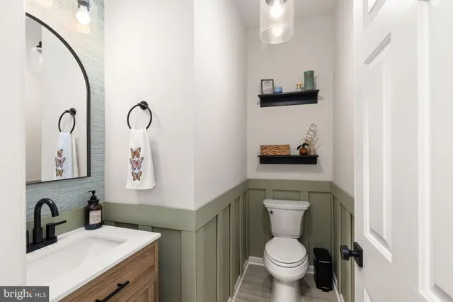 a swimming pool with outdoor seating and yard