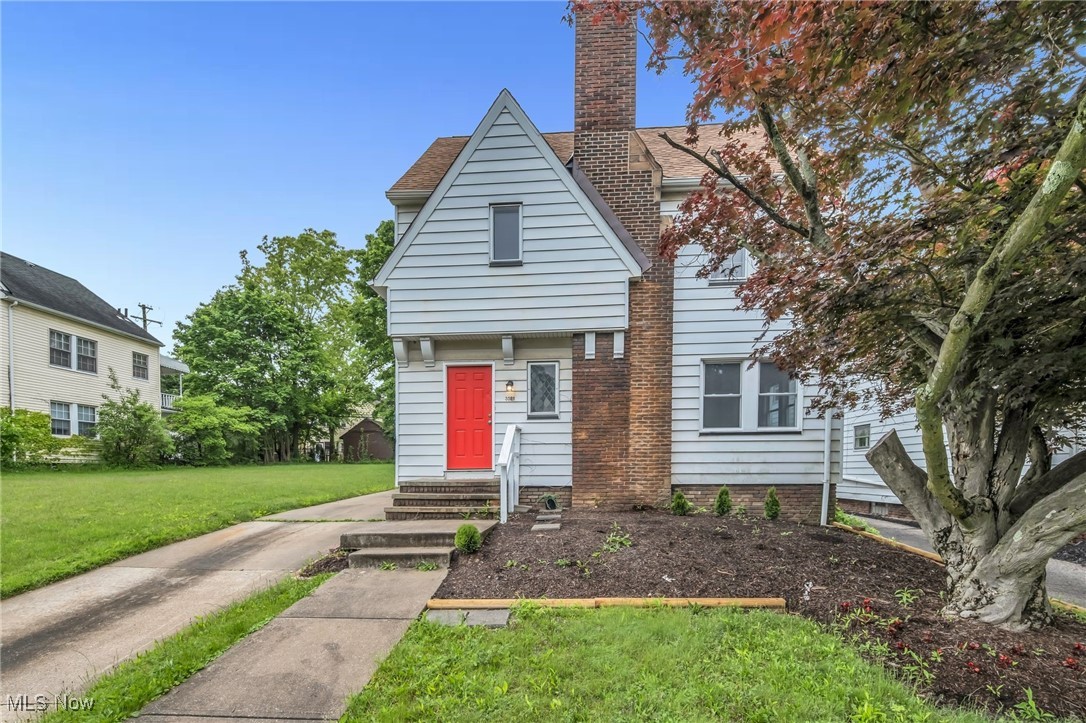 3528 Daleford Road Cleveland, OH 44120 - Photo 1 of 30 View of front of property featuring a front lawn and a chimney