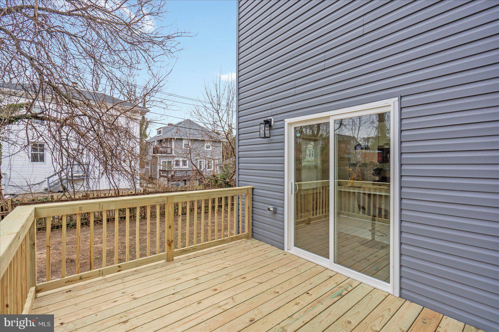 3925 Norfolk Avenue Baltimore, MD 21216 - Photo 44 of 49 a view of a wooden deck