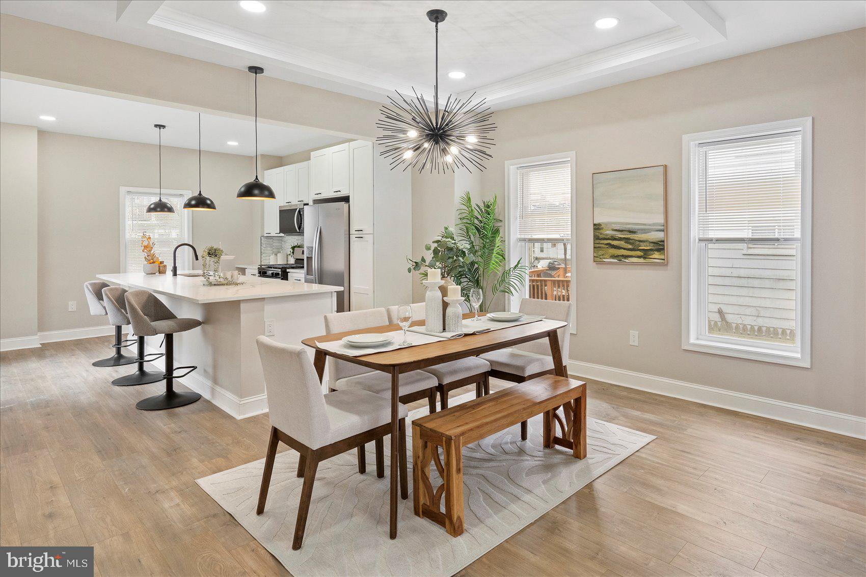 3925 Norfolk Avenue Baltimore, MD 21216 - Photo 10 of 49 a view of a dining room with furniture and a chandelier