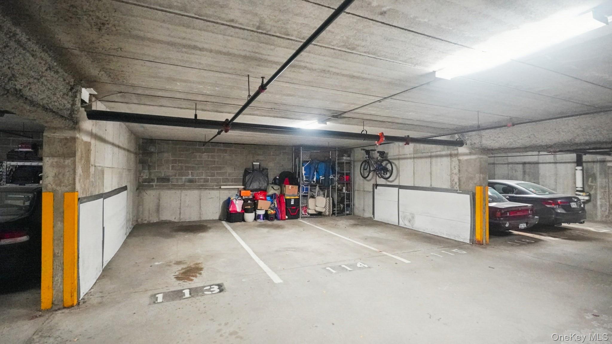 703 Pelham Road, Unit 107 New Rochelle, NY 10805 - Photo 14 of 14 a view of parking garage with cars