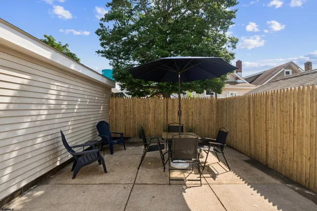 a view of chair and tables in the patio
