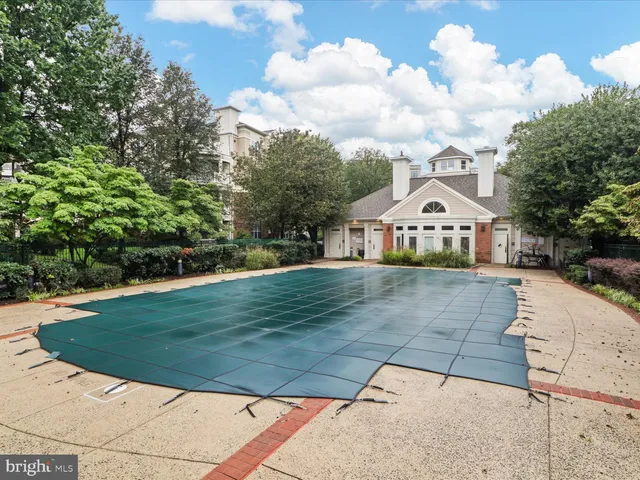 a front view of a house with parking space