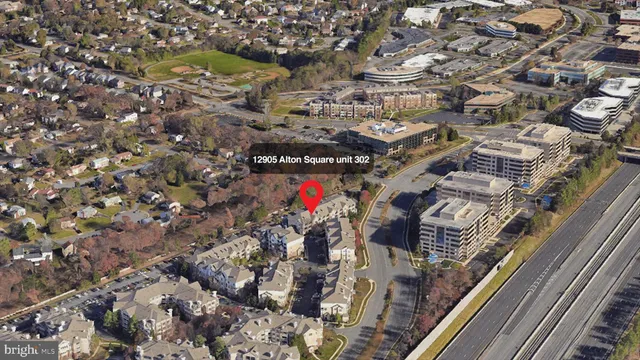 a front view of a house with large windows