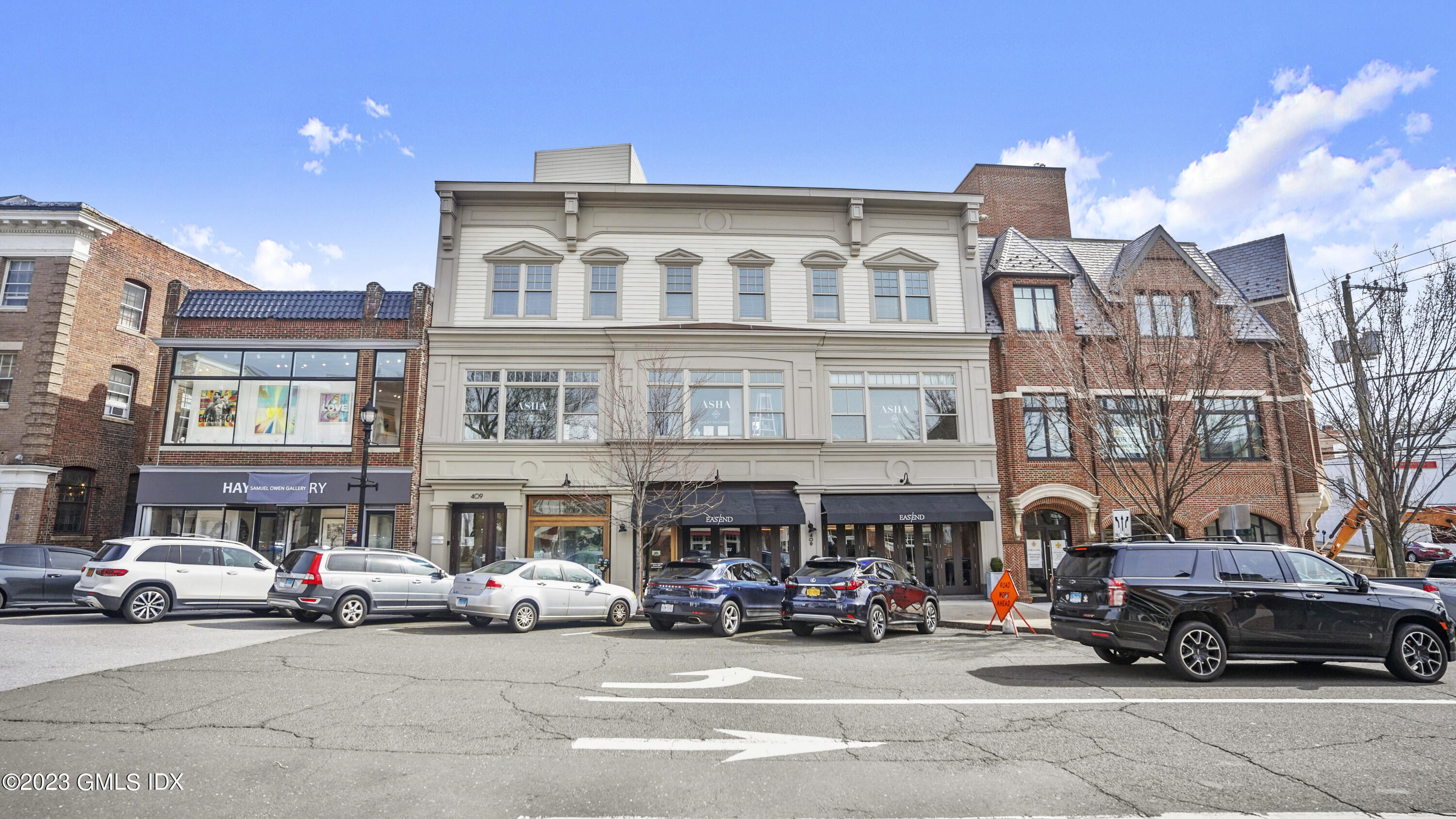 409 Greenwich Avenue, Unit A Greenwich, CT 06830 - Photo 16 of 17 a car parked in front of a building