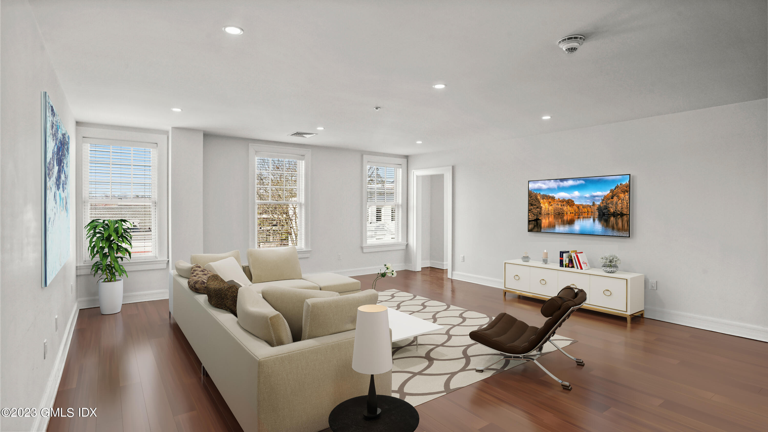 409 Greenwich Avenue, Unit A Greenwich, CT 06830 - Photo 5 of 17 a living room with furniture and a flat screen tv