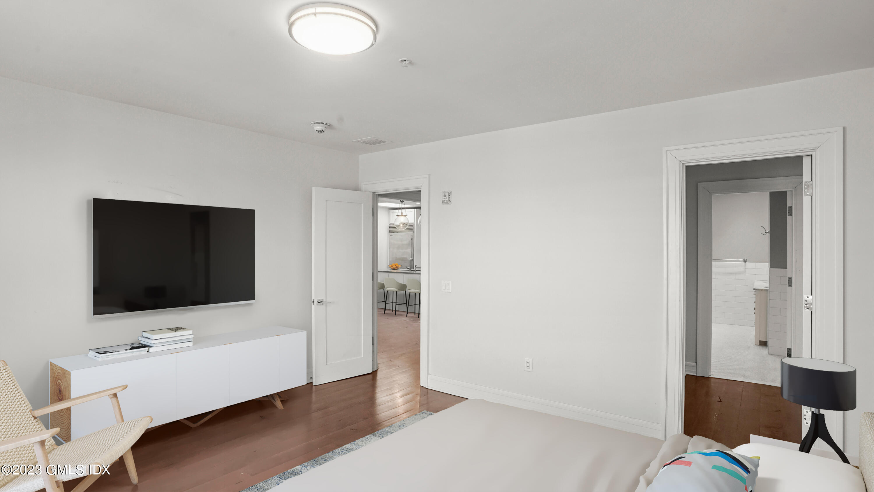 409 Greenwich Avenue, Unit A Greenwich, CT 06830 - Photo 7 of 17 a living room with furniture and a flat screen tv