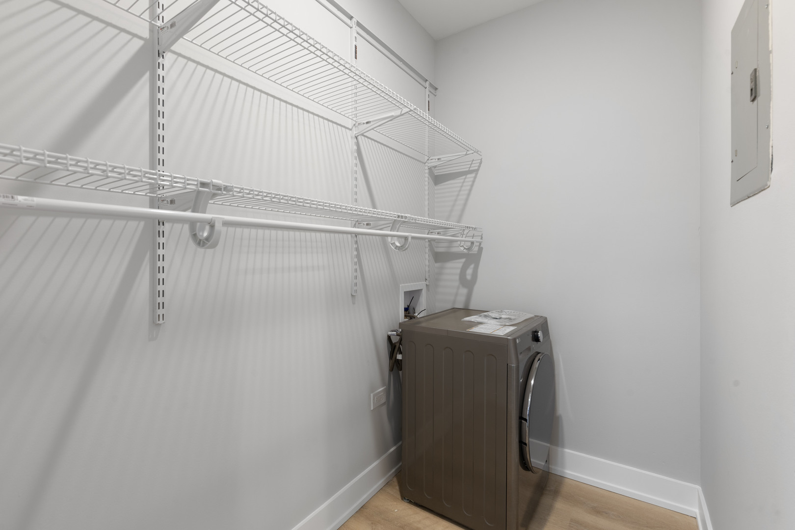 1634 West Howard Street, Unit 202 Chicago, IL 60626 - Photo 6 of 7 a utility room with dryer and washer