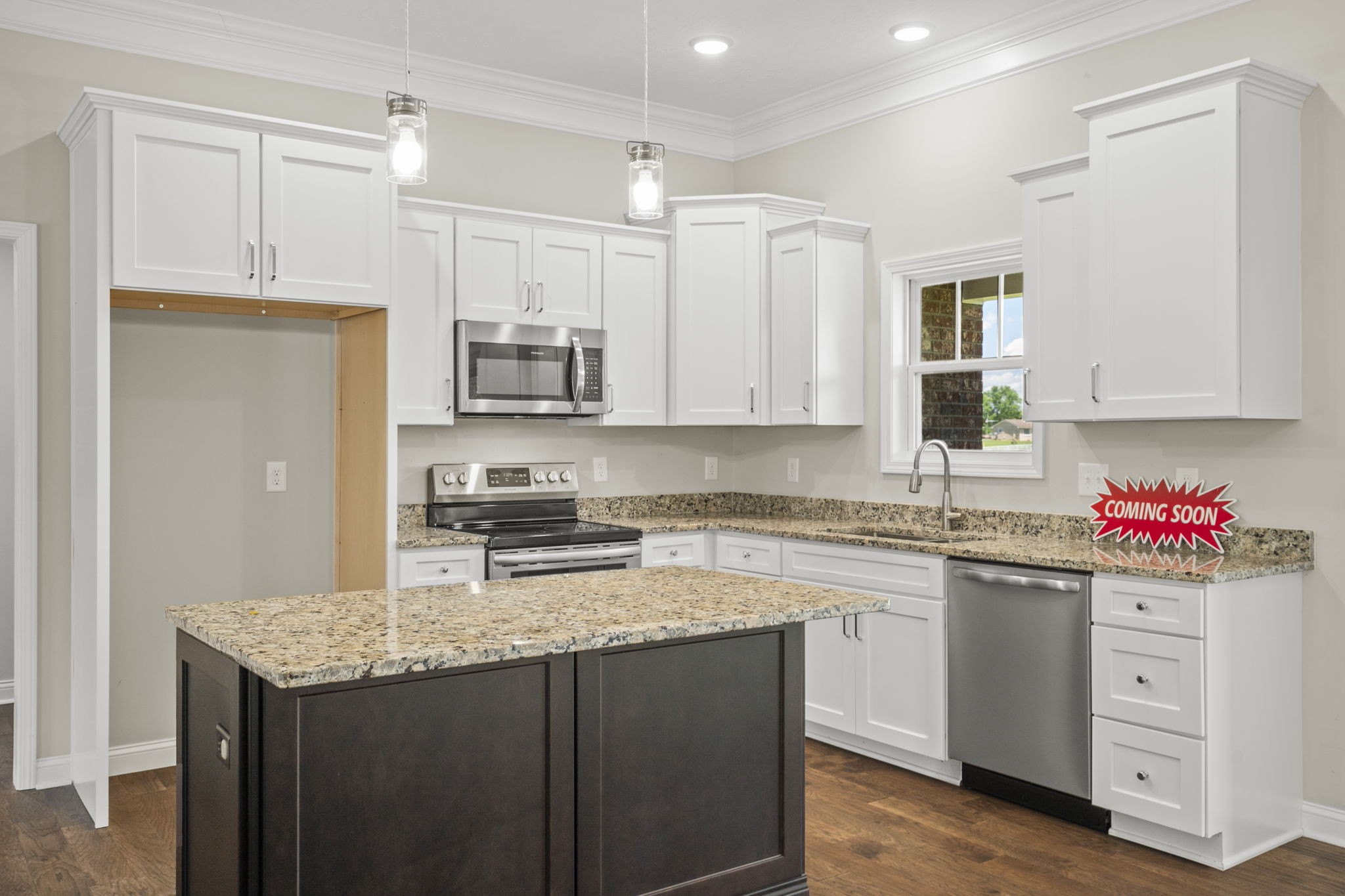 5718 Hoods Branch Road Springfield, TN 37172 - Photo 12 of 47 a kitchen with stainless steel appliances granite countertop a sink stove and refrigerator