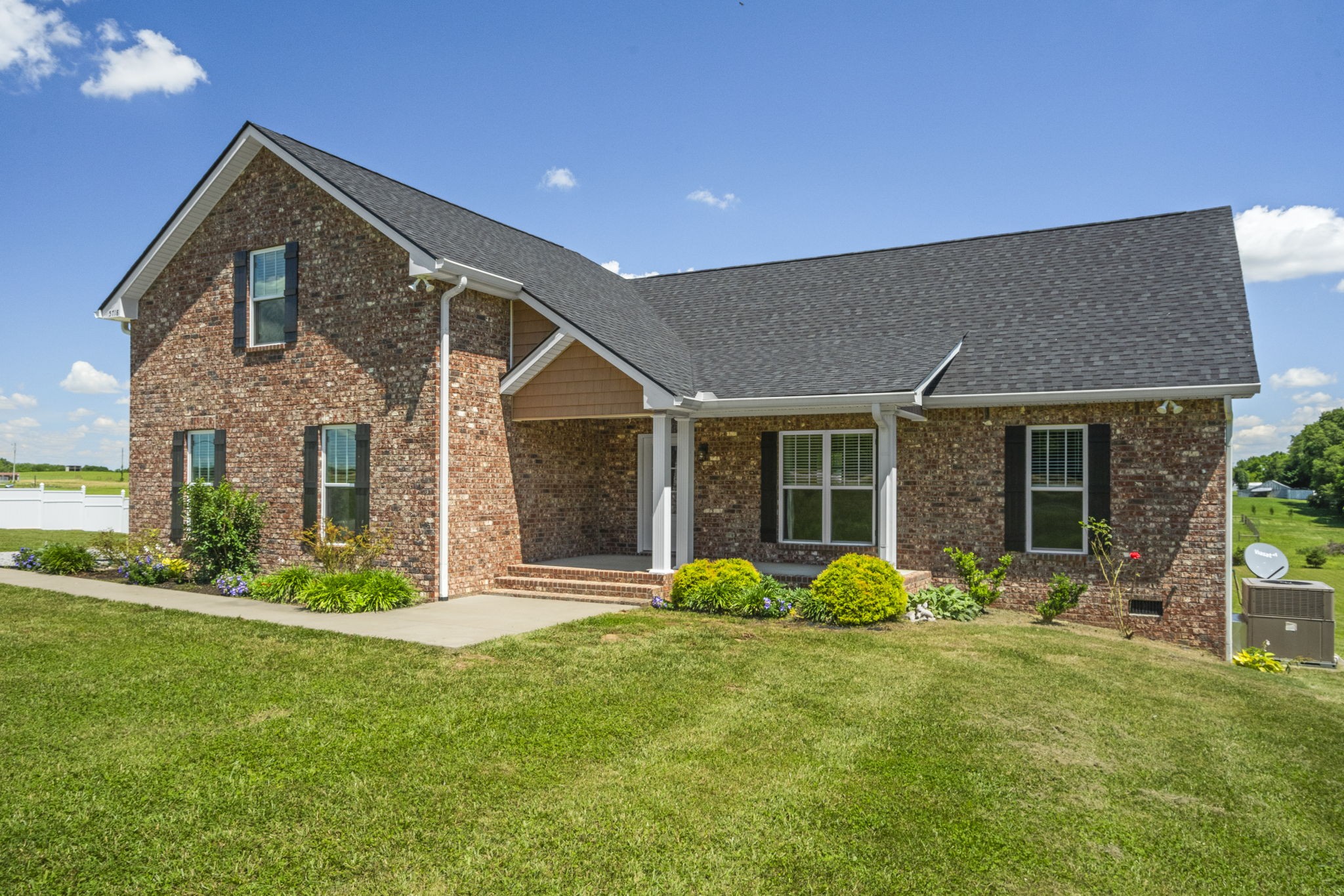 5718 Hoods Branch Road Springfield, TN 37172 - Photo 2 of 47 a front view of a house with garden