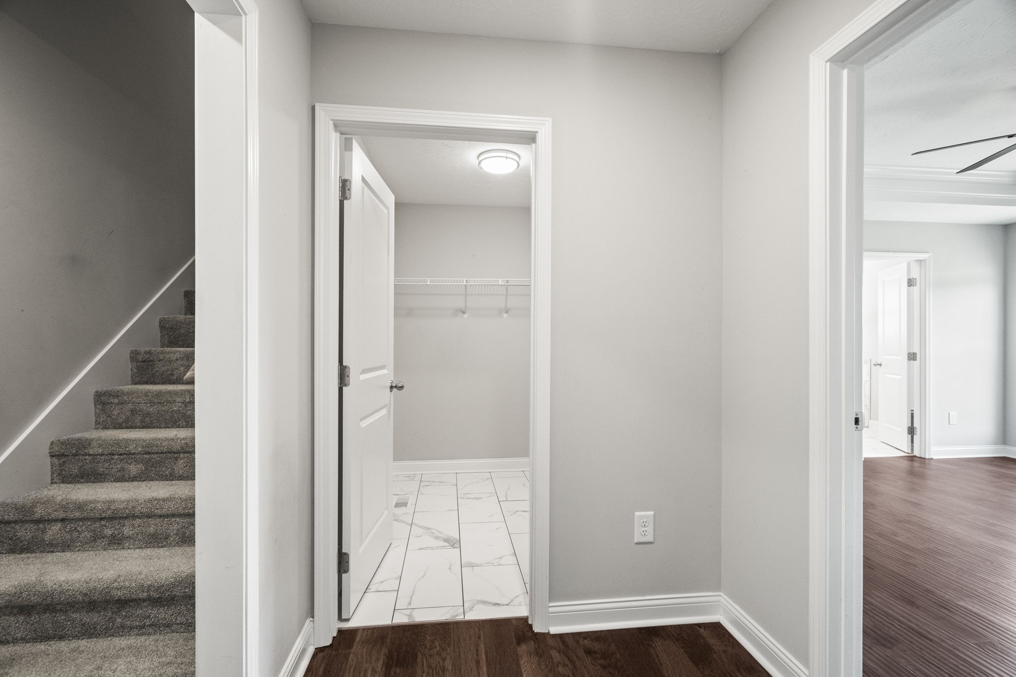 5718 Hoods Branch Road Springfield, TN 37172 - Photo 21 of 47 a view of a hallway with wooden floor and entryway