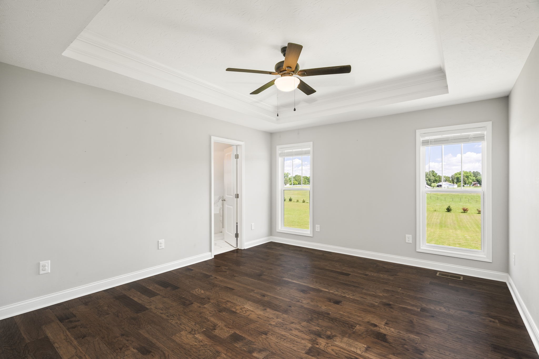 5718 Hoods Branch Road Springfield, TN 37172 - Photo 23 of 47 a view of empty room with wooden floor and fan