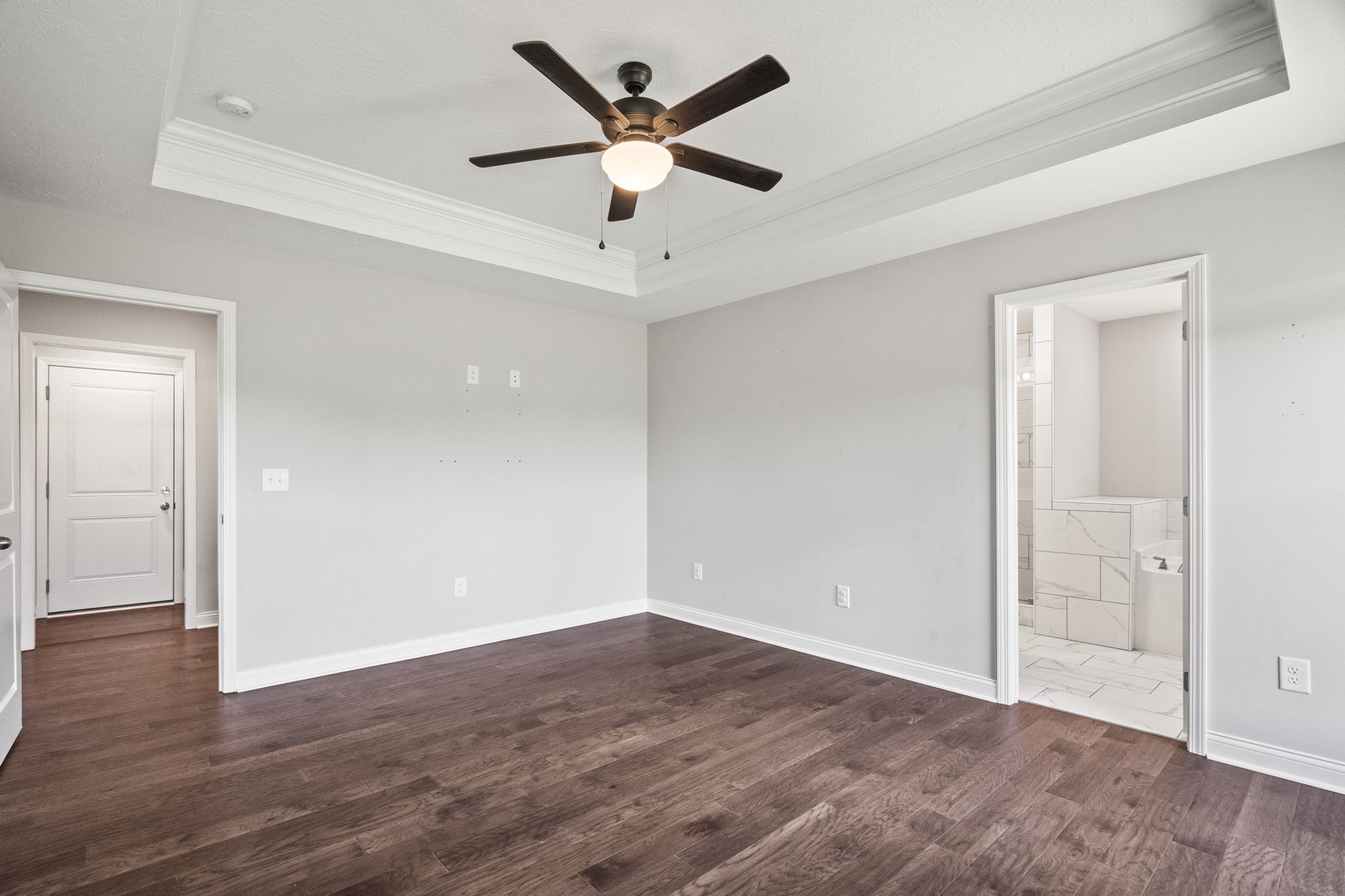 5718 Hoods Branch Road Springfield, TN 37172 - Photo 25 of 47 an empty room with wooden floor and ceiling fan