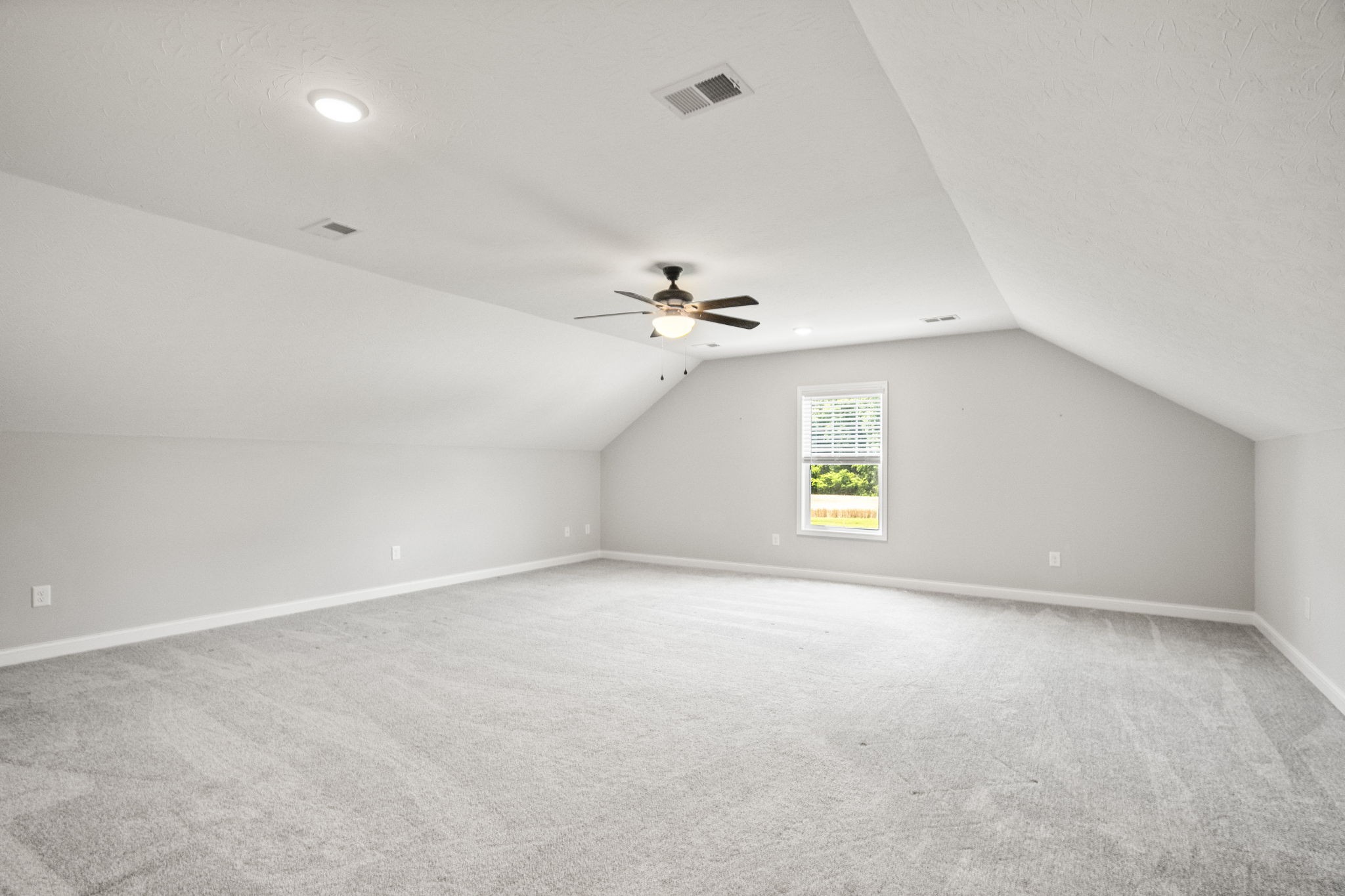 5718 Hoods Branch Road Springfield, TN 37172 - Photo 29 of 47 an empty room with a window and a ceiling fan