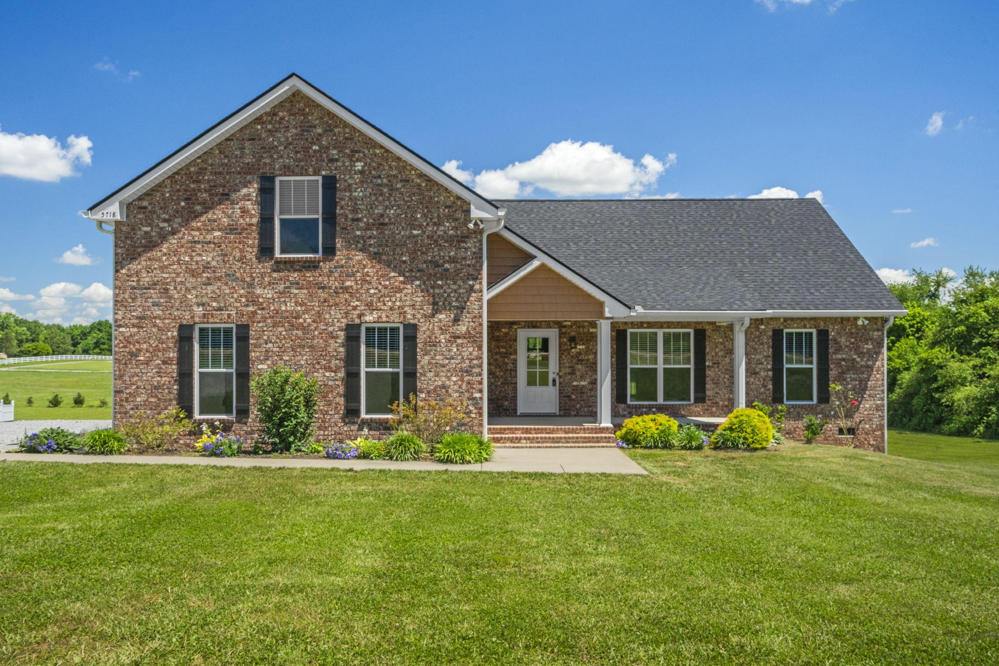 5718 Hoods Branch Road Springfield, TN 37172 - Photo 3 of 47 a front view of a house with garden